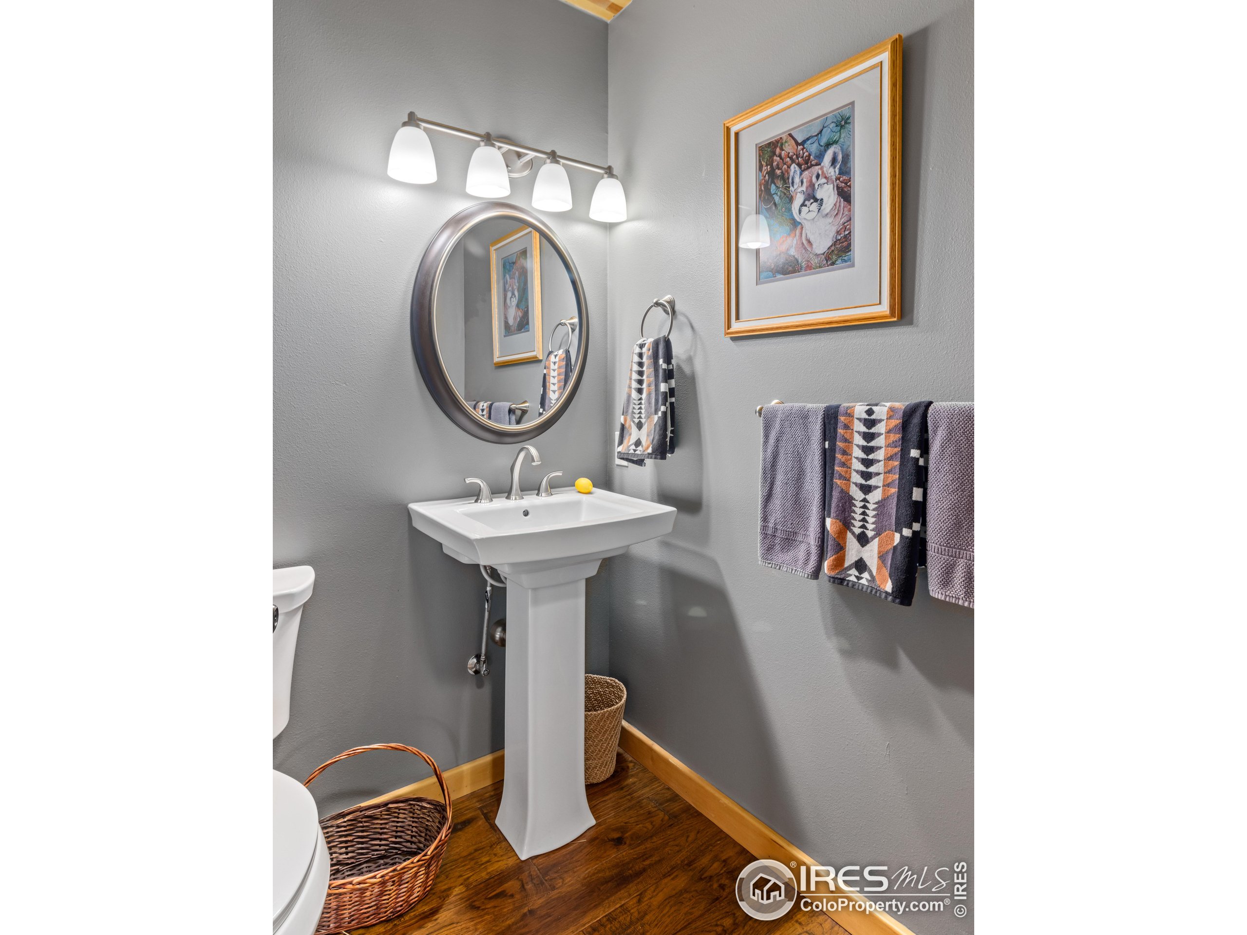 470 Big John Road Lyons, CO 80540 - Photo 20 of 38 a bathroom with a sink and a mirror