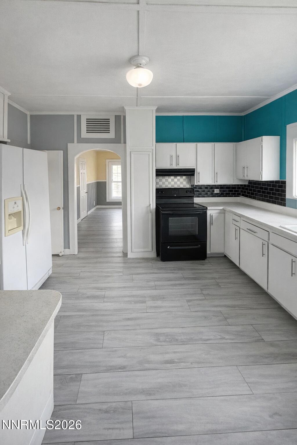 697 Mc Lean Street Fallon, NV 89406 - Photo 6 of 15 Cozy kitchen with teal accent wall