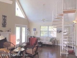 64 Manresa Road St. Augustine, FL 32084 - Photo 12 of 31 a living room with furniture and a large window
