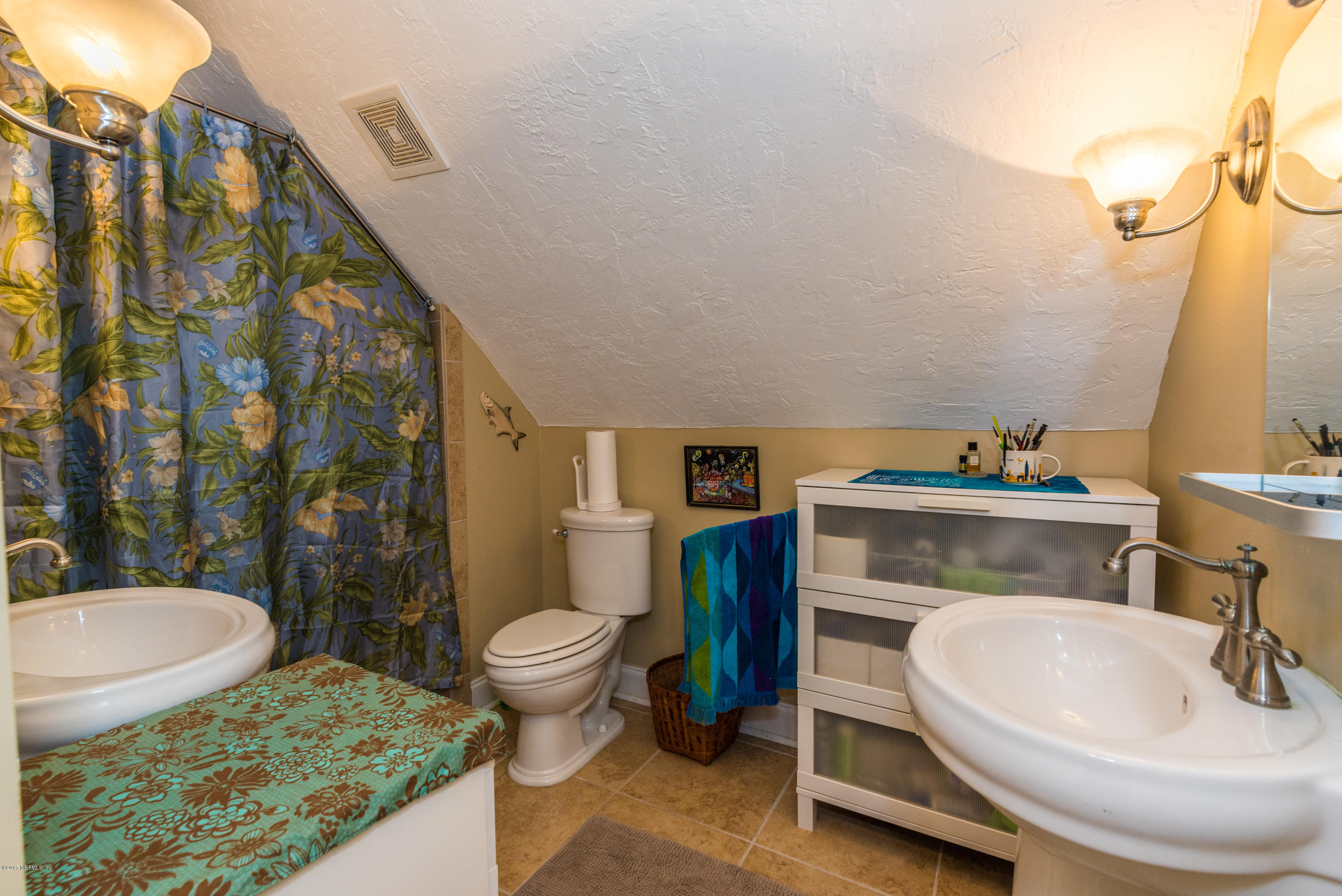 64 Manresa Road St. Augustine, FL 32084 - Photo 20 of 31 a bathroom with a sink and a toilet
