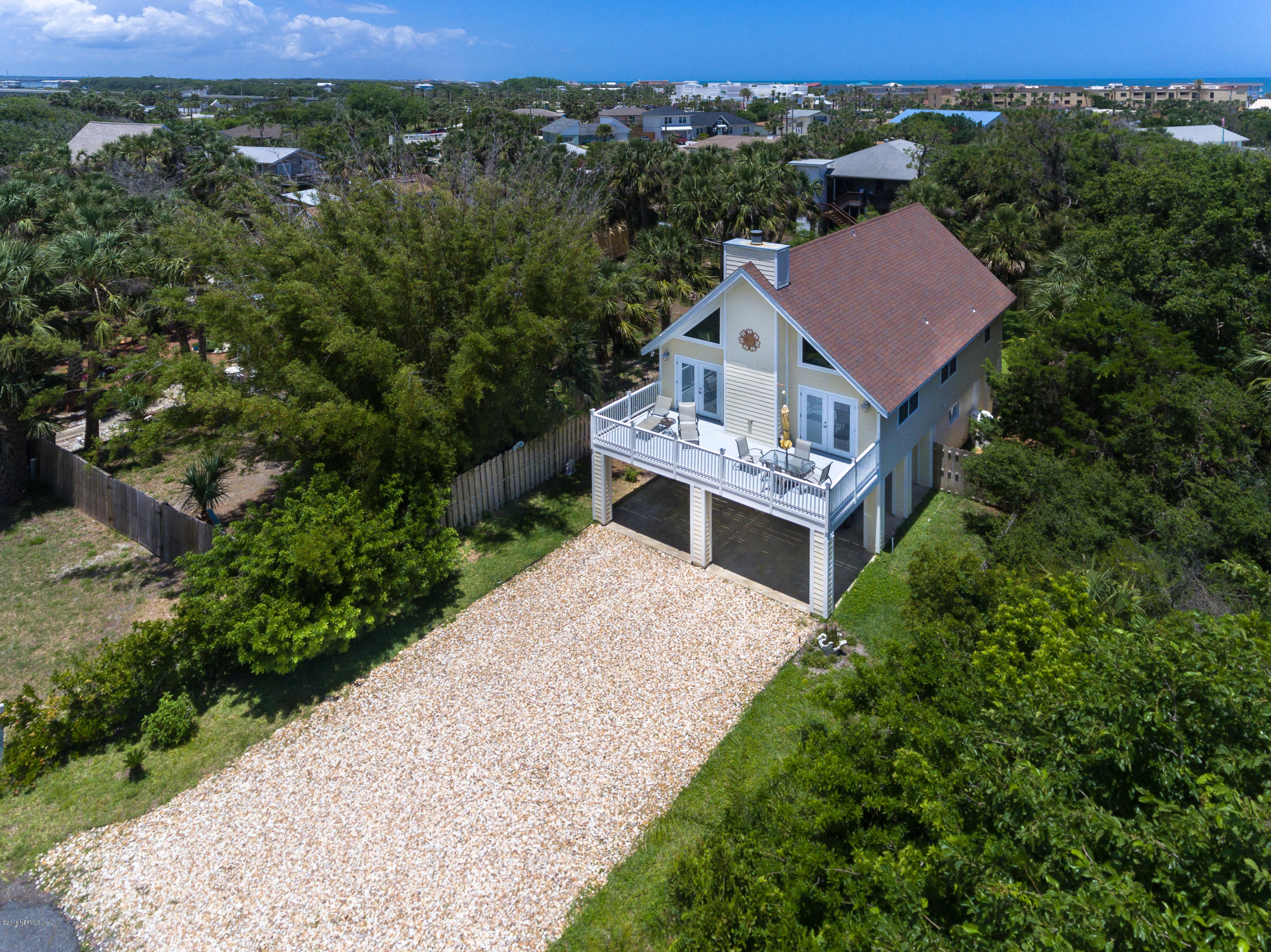 64 Manresa Road St. Augustine, FL 32084 - Photo 30 of 31 an aerial view of a house with a yard