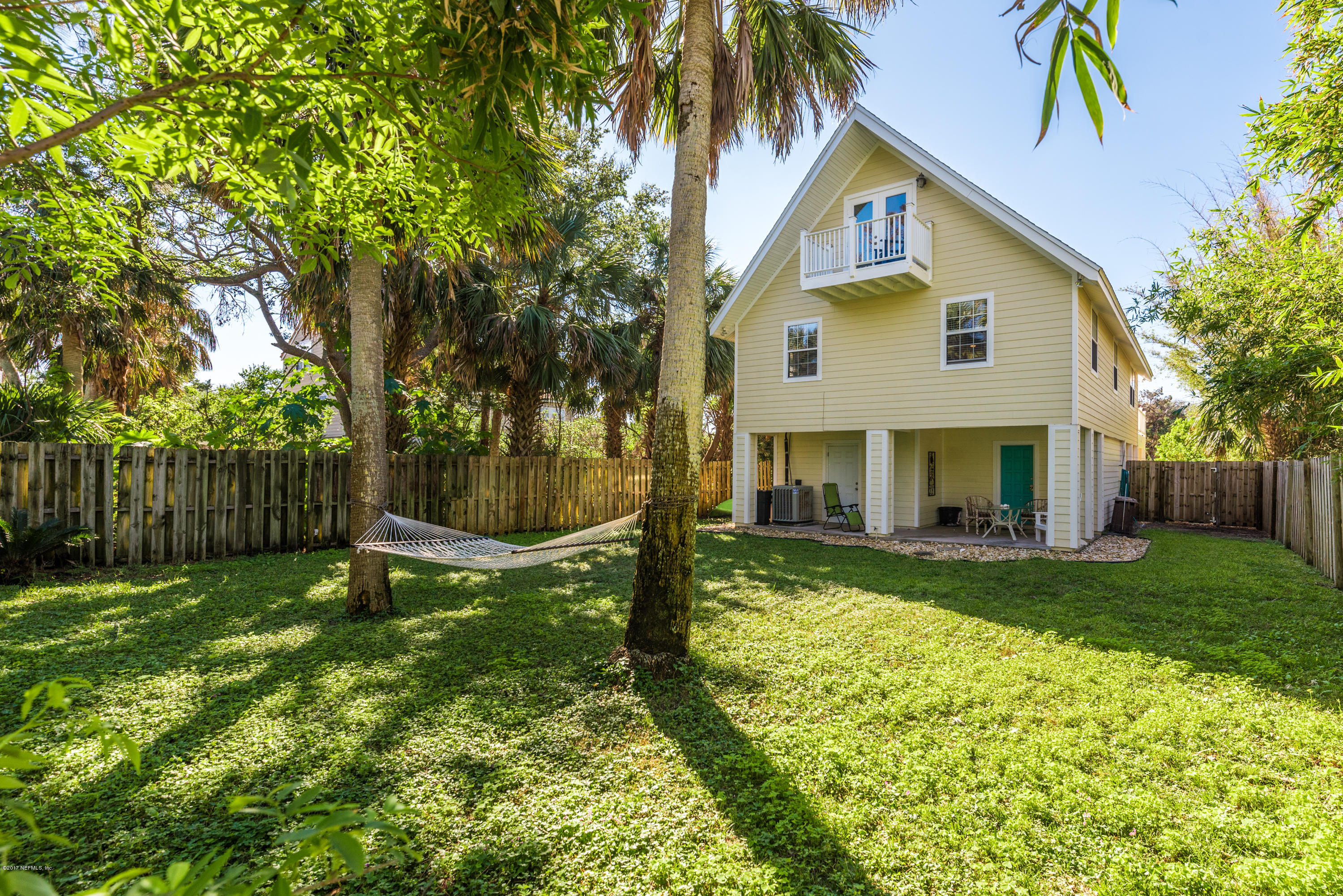 64 Manresa Road St. Augustine, FL 32084 - Photo 3 of 31 a view of a house with a yard and sitting area