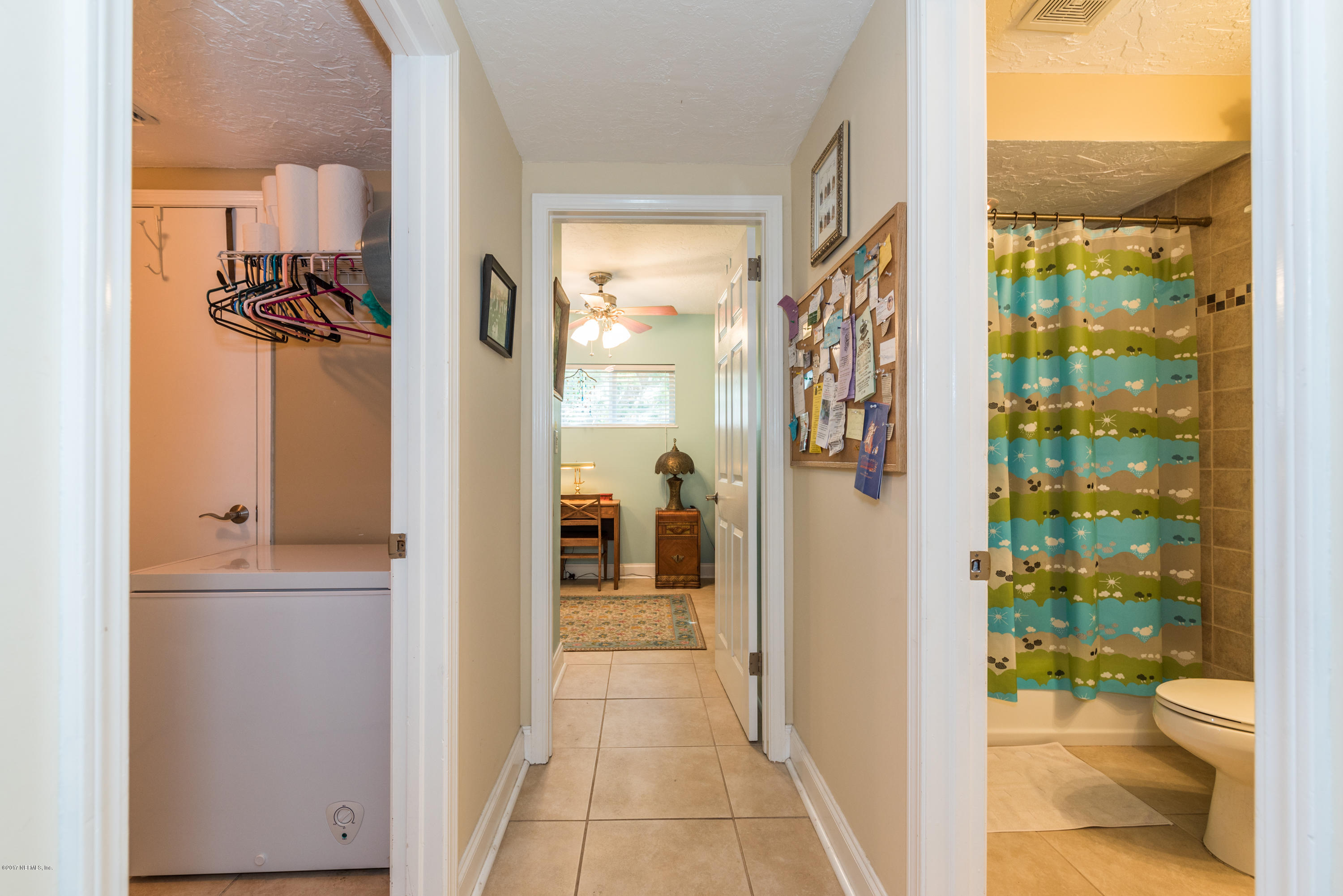 64 Manresa Road St. Augustine, FL 32084 - Photo 6 of 31 a bathroom with a shower