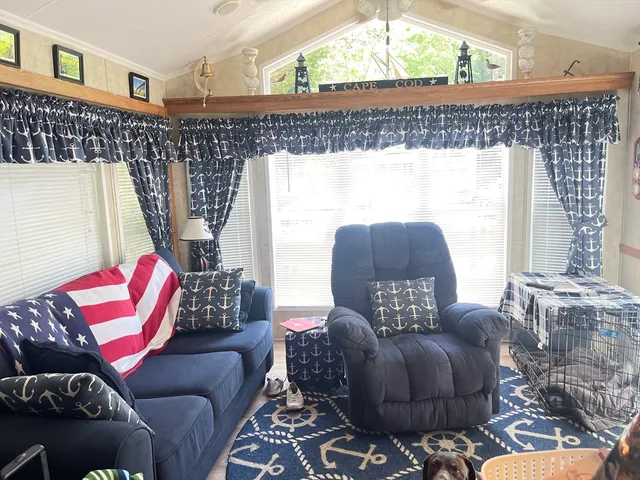 a view of a chairs and tables in a room