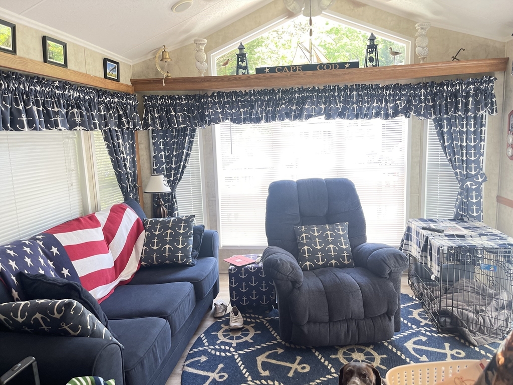 185 Cotuit Road, Unit C5 ASPEN Sandwich, MA 02563 - Photo 11 of 17 a living room with furniture and a large window