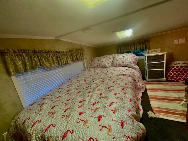 a bathroom with a sink a mirror and a shower