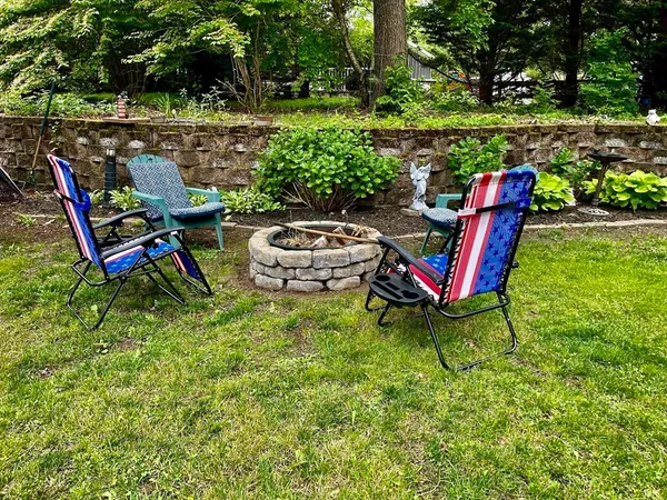 a backyard of a house with lots of green space