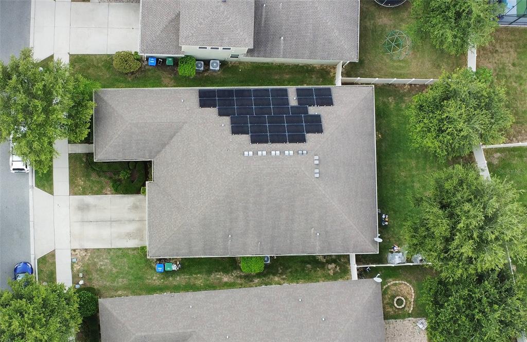 4918 Wildwood Pointe Road Winter Garden, FL 34787 - Photo 31 of 33 an aerial view of a house with a yard and large trees