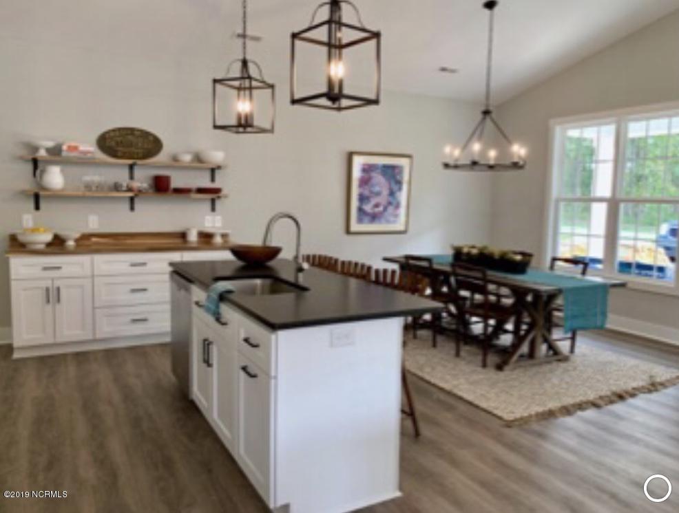 604 Washington Acres Road Hampstead, NC 28443 - Photo 4 of 17 This Home is now 85% complete. Completed staged photos are from an identical home built at 157 Fairfield Drive, Wilmington, NC 28401 which just closed for $299,900.
