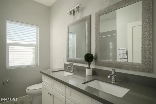 a bathroom with a sink and a toilet