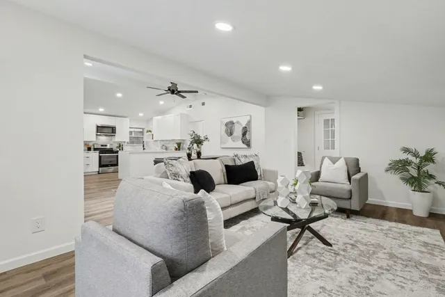 a living room with furniture and a couch