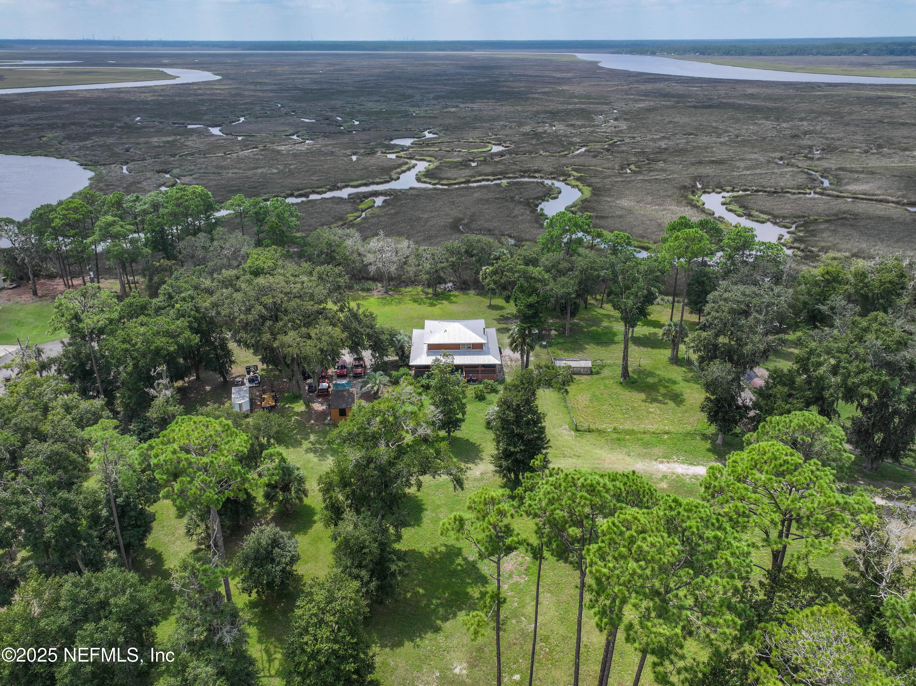 85013 Avant Road Yulee, FL 32097 - Photo 11 of 21 a view of a lake with beach and city space