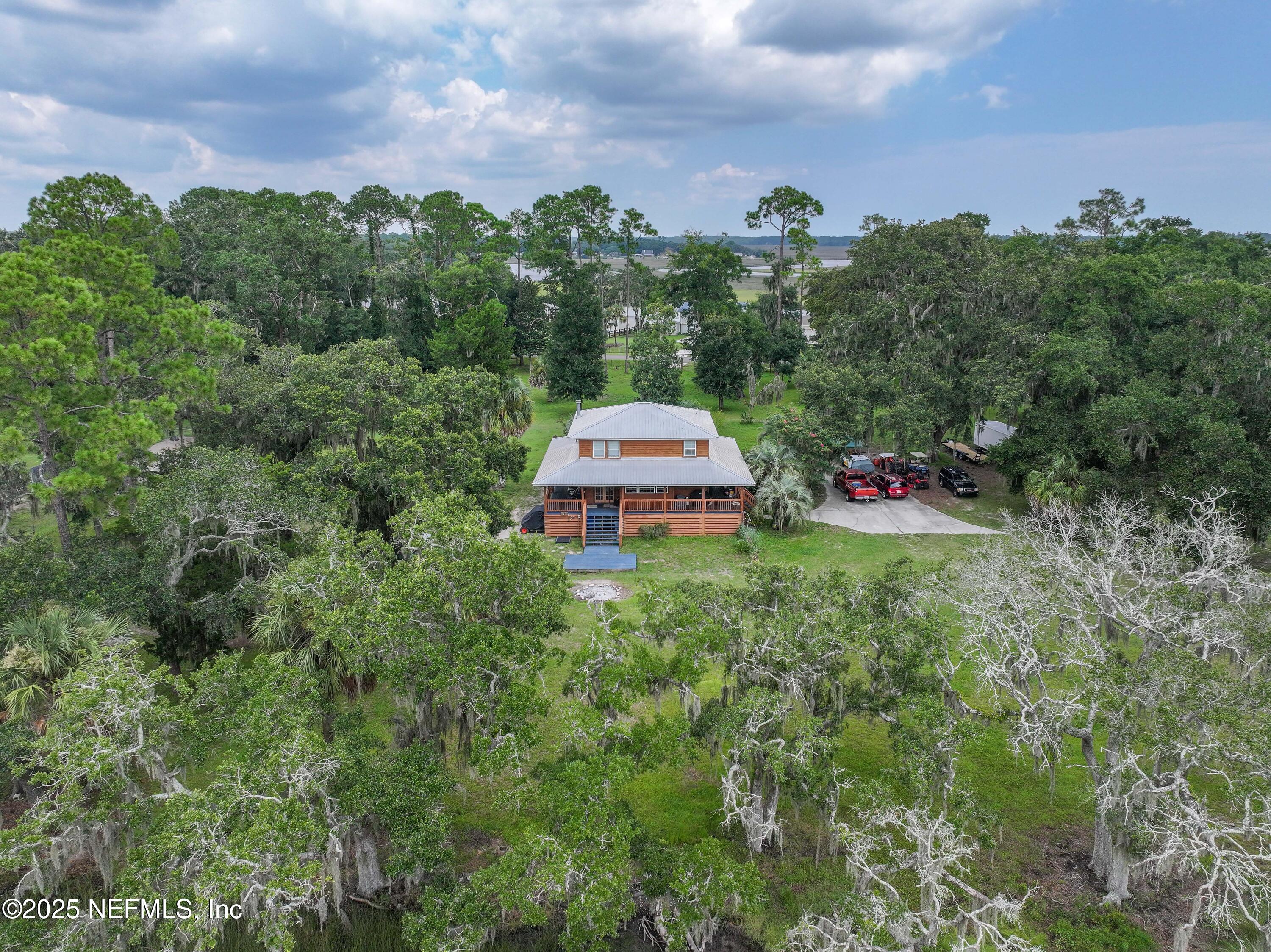 85013 Avant Road Yulee, FL 32097 - Photo 14 of 21 an outdoor space with lots of green space and mountain view