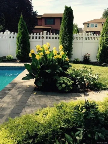 a view of kitchen with kitchen island and living room