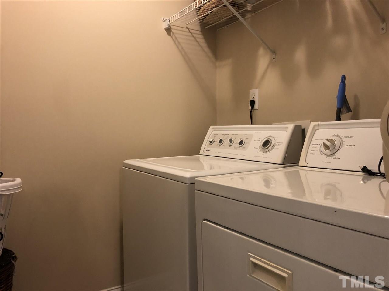 3914 Magnolia Pond Road Raleigh, NC 27610 - Photo 12 of 15 a utility room with dryer and washer