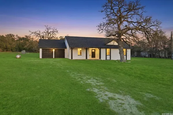 a house view with garden space