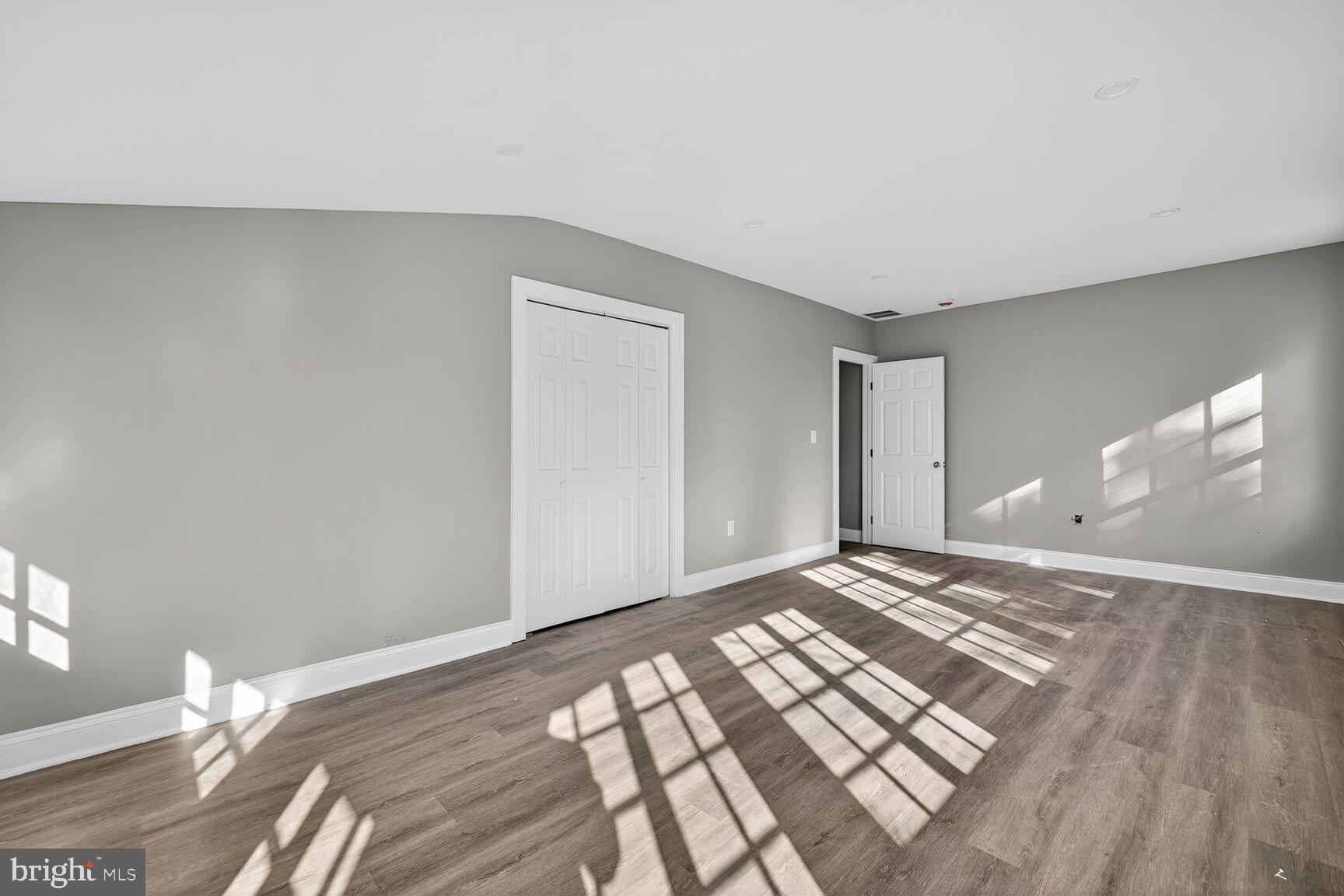 401 Linden Avenue Frederick, MD 21703 - Photo 19 of 29 a view of a room with wooden floor and bedroom
