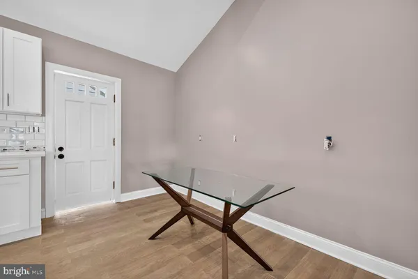 a view of a hallway with entryway