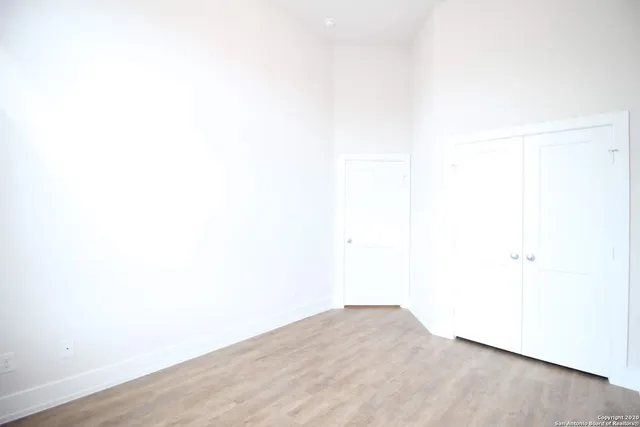 a view of a room that has a window in it