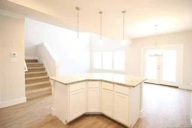 a view of a room with lots of appliances