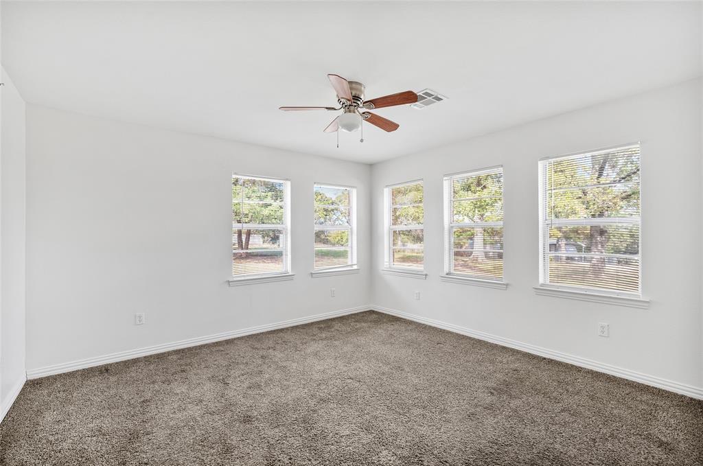 531 Coe Road Denison, TX 75021 - Photo 11 of 22 a view of an empty room with a window