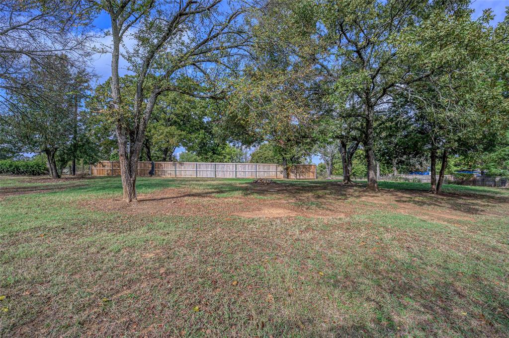 531 Coe Road Denison, TX 75021 - Photo 20 of 22 a view of backyard with green space