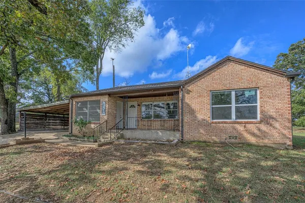 a front view of house with yard