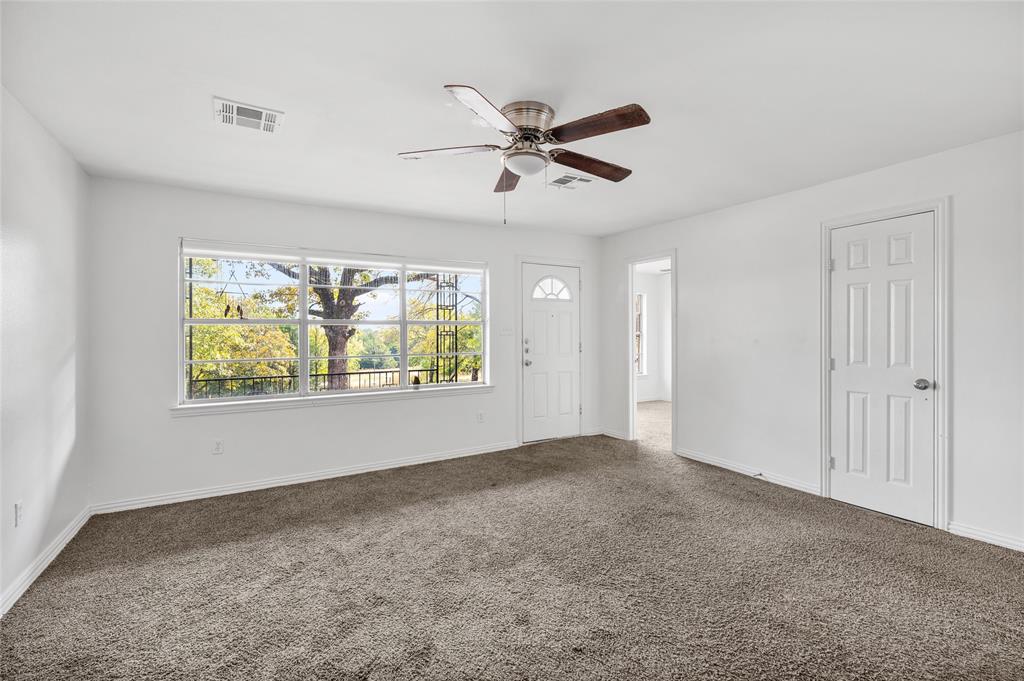 531 Coe Road Denison, TX 75021 - Photo 5 of 22 a view of an empty room and window
