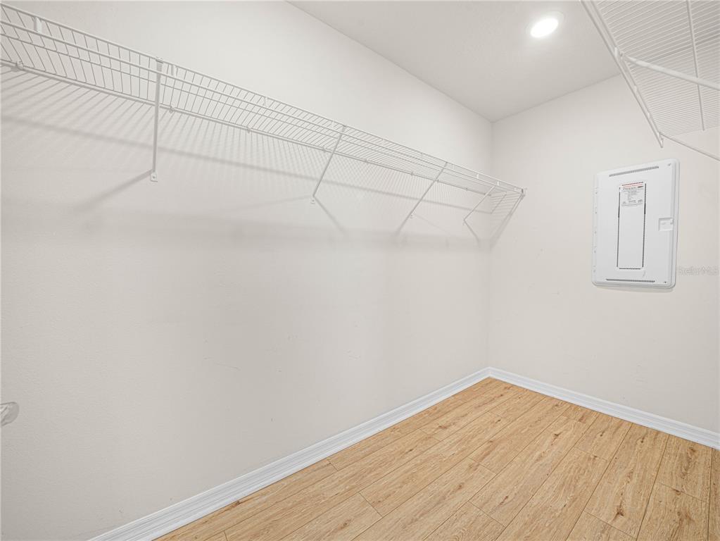 4580 Sparkling Shell Avenue Kissimmee, FL 34746 - Photo 29 of 42 a view of a room with wooden floor