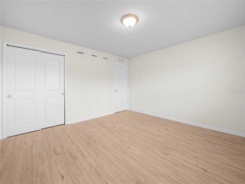 4580 Sparkling Shell Avenue Kissimmee, FL 34746 - Photo 33 of 42 wooden floor in a room