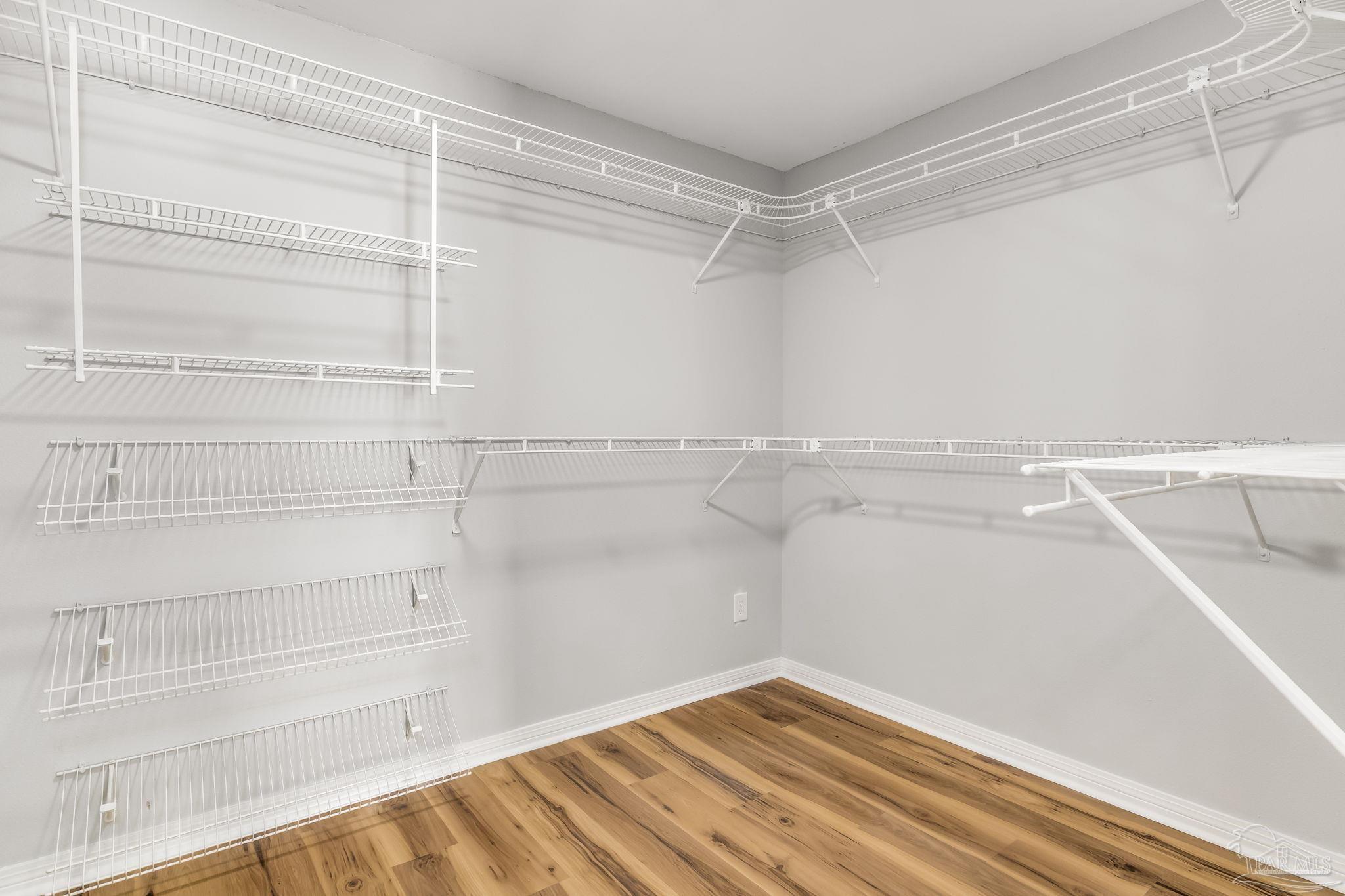 6357 Shady Lane Milton, FL 32570 - Photo 23 of 57 a view of a room with racks on the wall