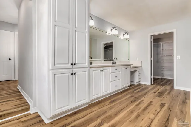 a bathroom with a bathtub and a toilet