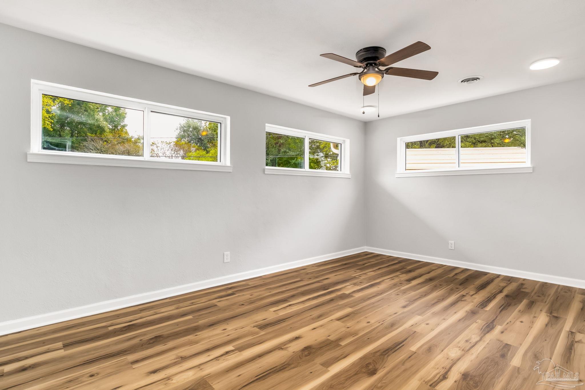 6357 Shady Lane Milton, FL 32570 - Photo 30 of 57 a view of an empty room with a window