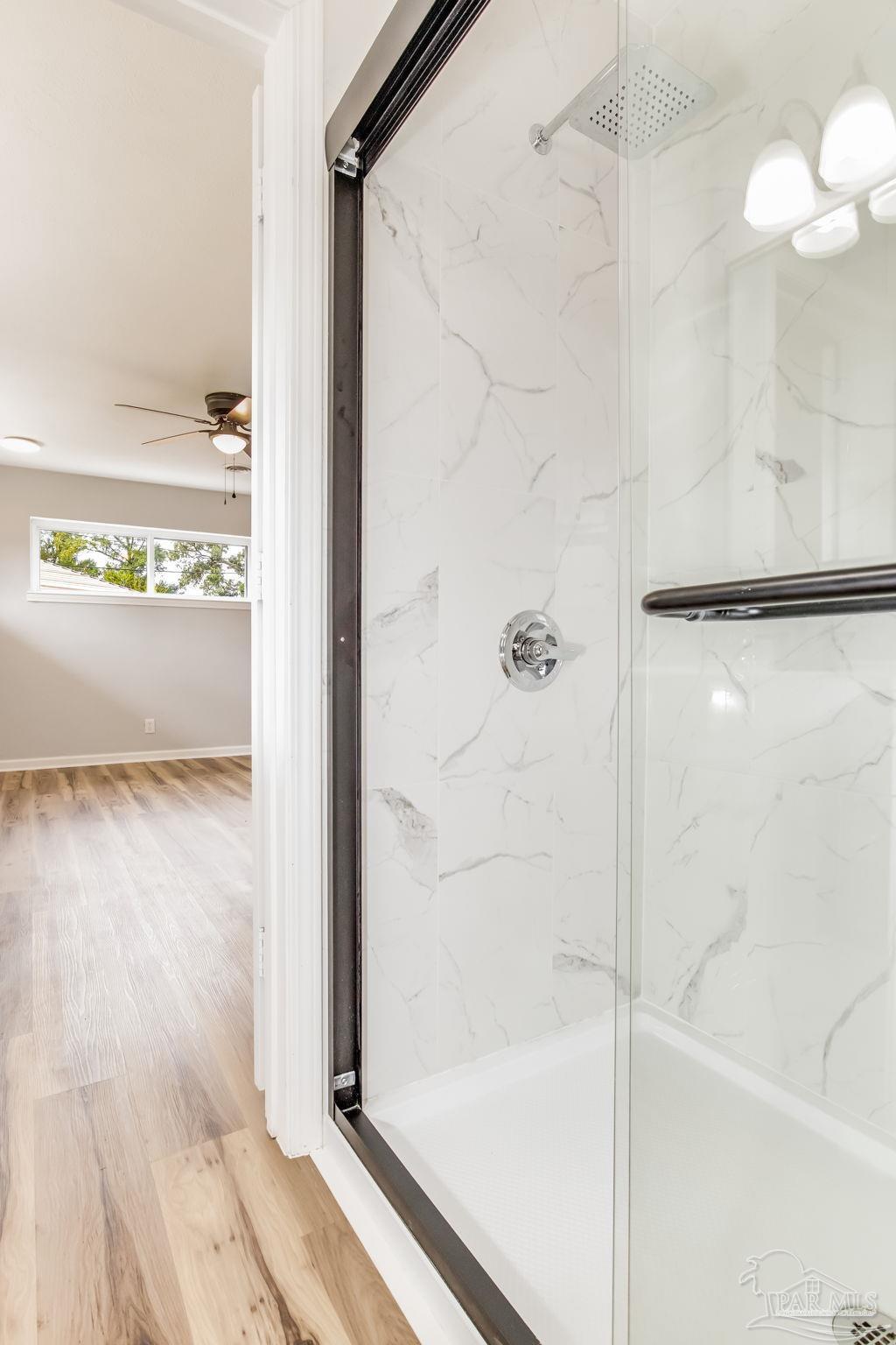 6357 Shady Lane Milton, FL 32570 - Photo 34 of 57 a bathroom with a shower