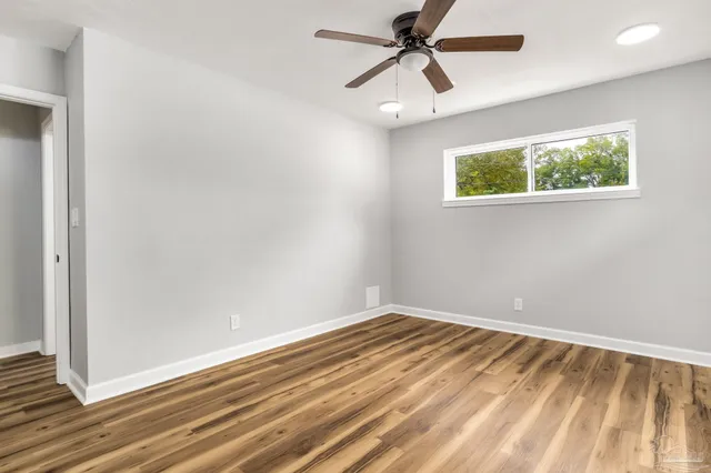 a bathroom with a sink a toilet and bathtub