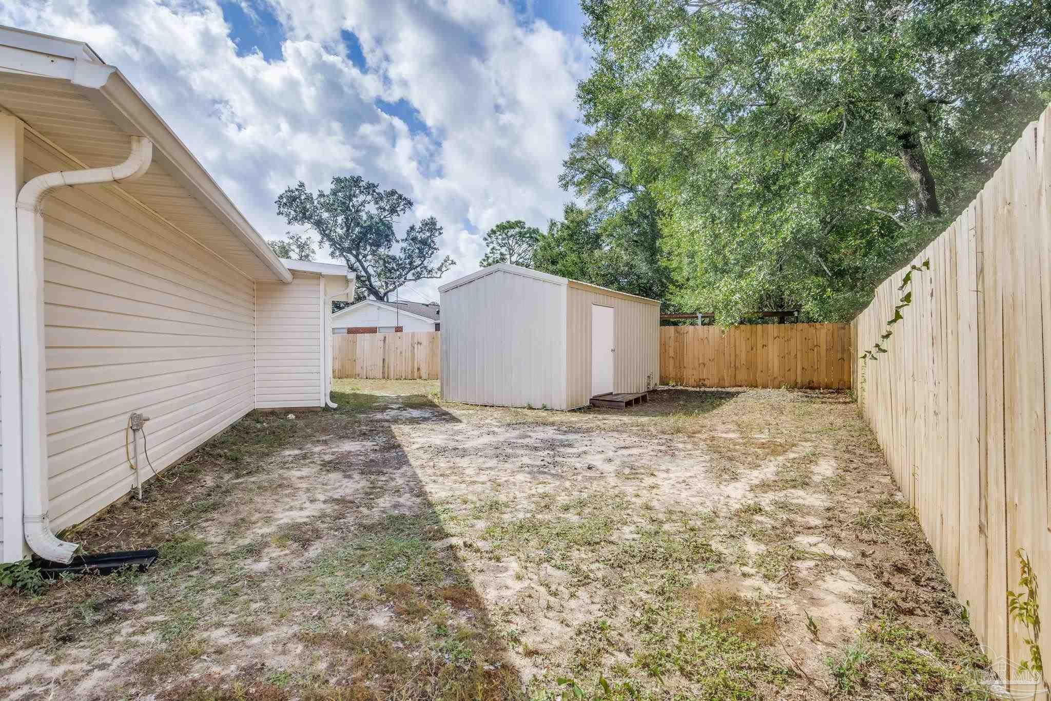 6357 Shady Lane Milton, FL 32570 - Photo 51 of 57 a backyard of a house