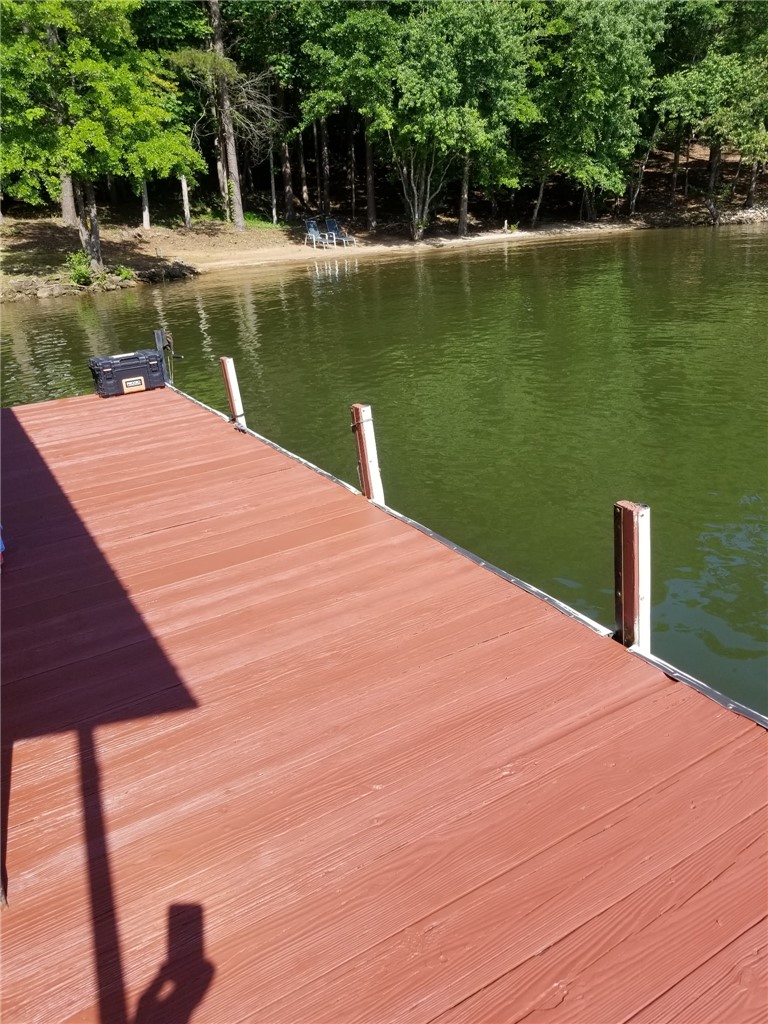 110 Snug Harbor Road Seneca, SC 29678 - Photo 35 of 37 Enjoy direct water access from this spacious dock, perfect for waterfront recreation. Picture taken at full pond.