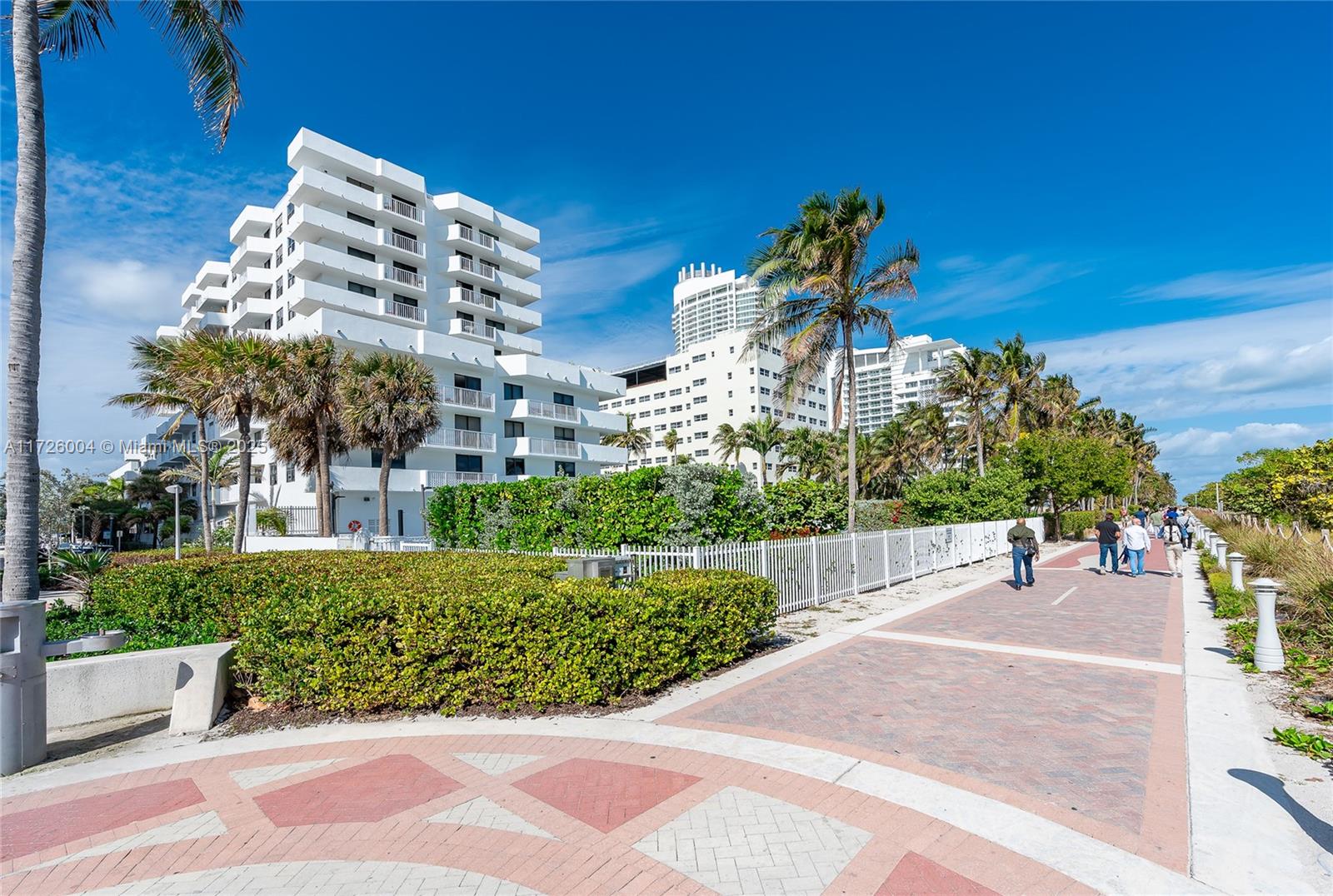 4301 Collins Avenue, Unit 1003 Miami Beach, FL 33140 - Photo 23 of 37 a view of a building with a garden