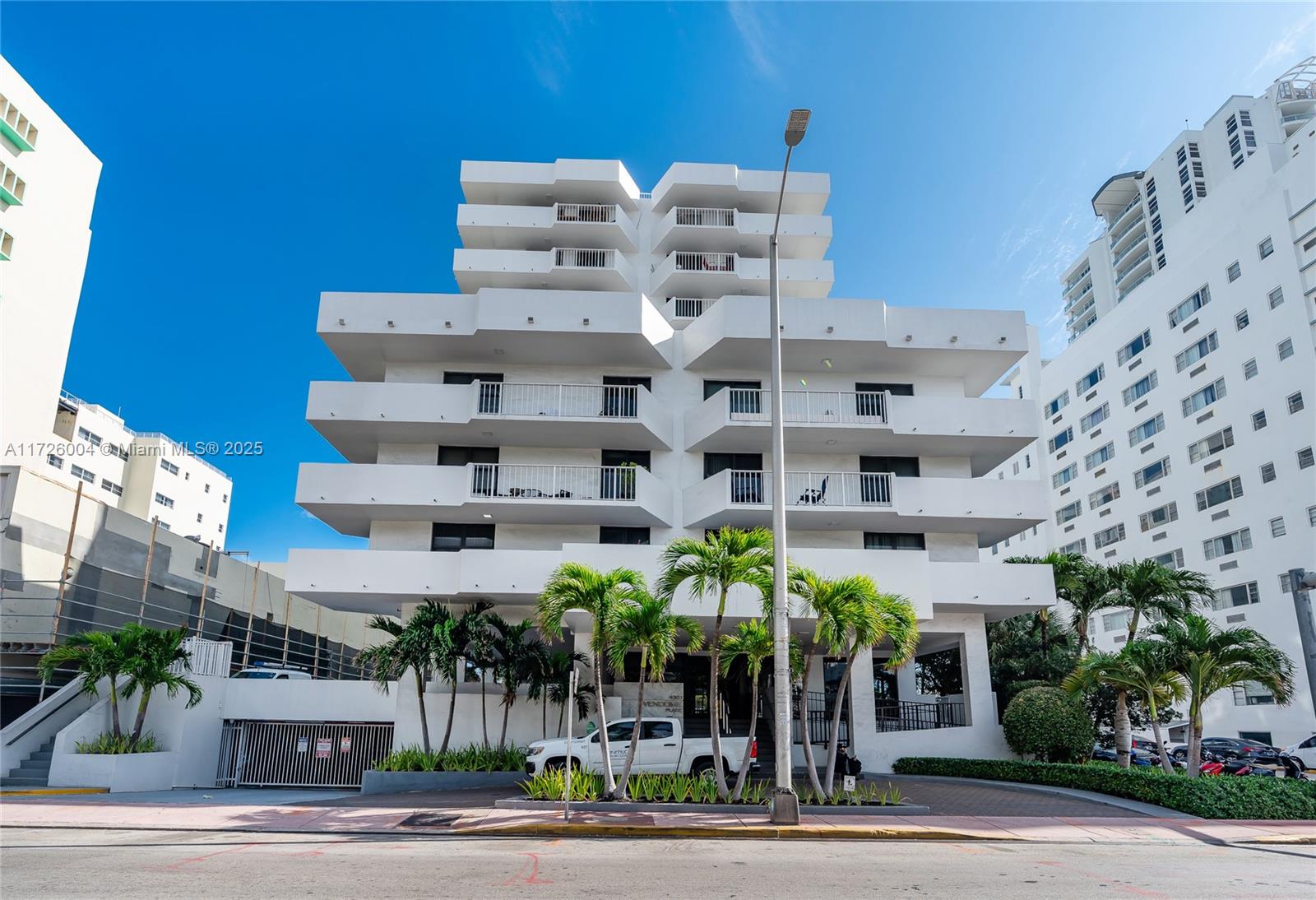 4301 Collins Avenue, Unit 1003 Miami Beach, FL 33140 - Photo 29 of 37 a view of a building and a street