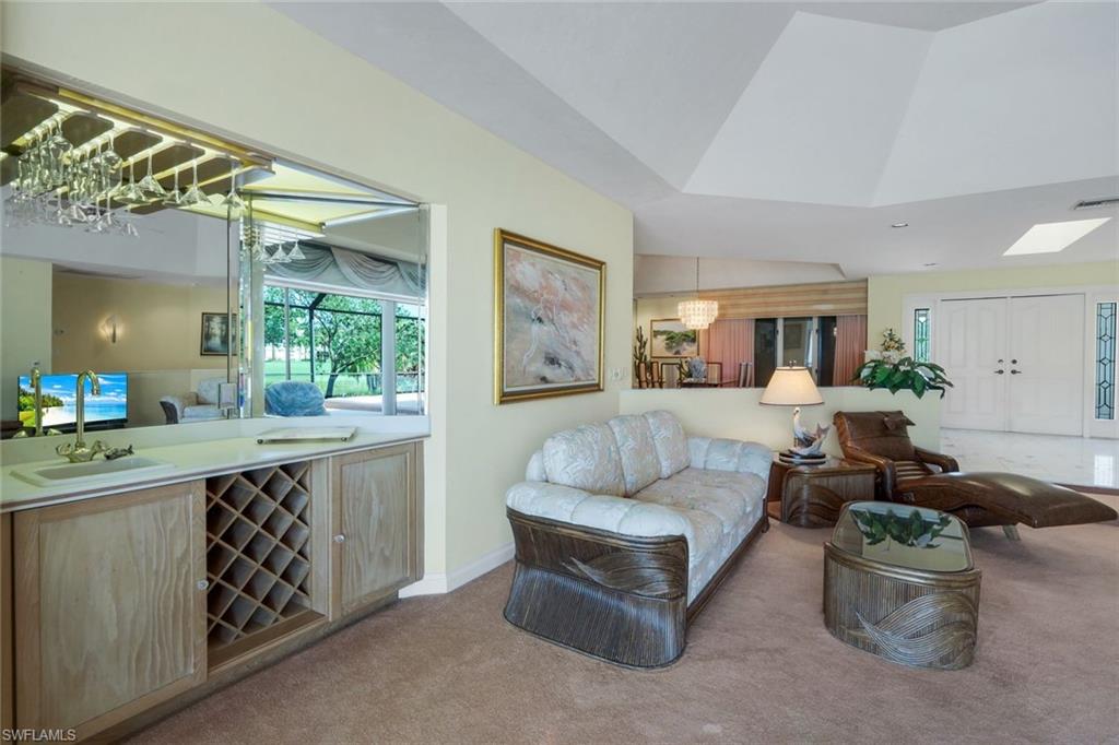 2227 Regal Way Naples, FL 34110 - Photo 12 of 34 Living Room Bar