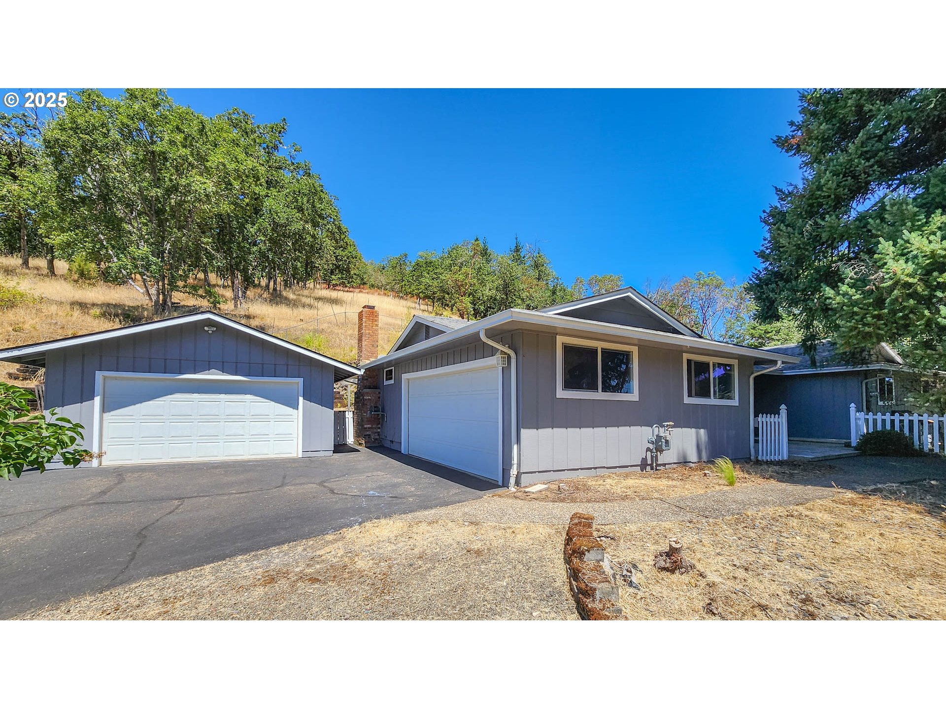 6649 Garden Valley Road Roseburg, OR 97471 - Photo 2 of 44 a house view with a outdoor space