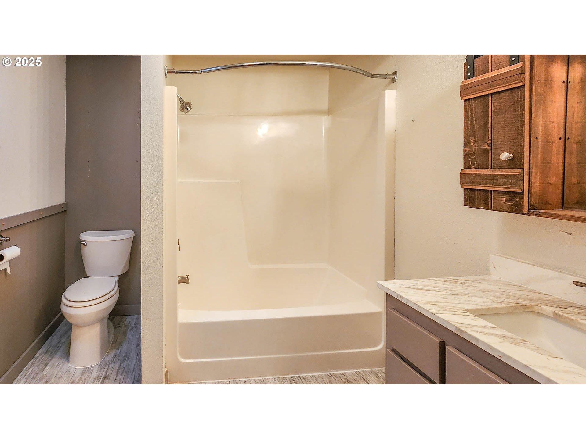 6649 Garden Valley Road Roseburg, OR 97471 - Photo 32 of 44 a bathroom with a sink a toilet and shower