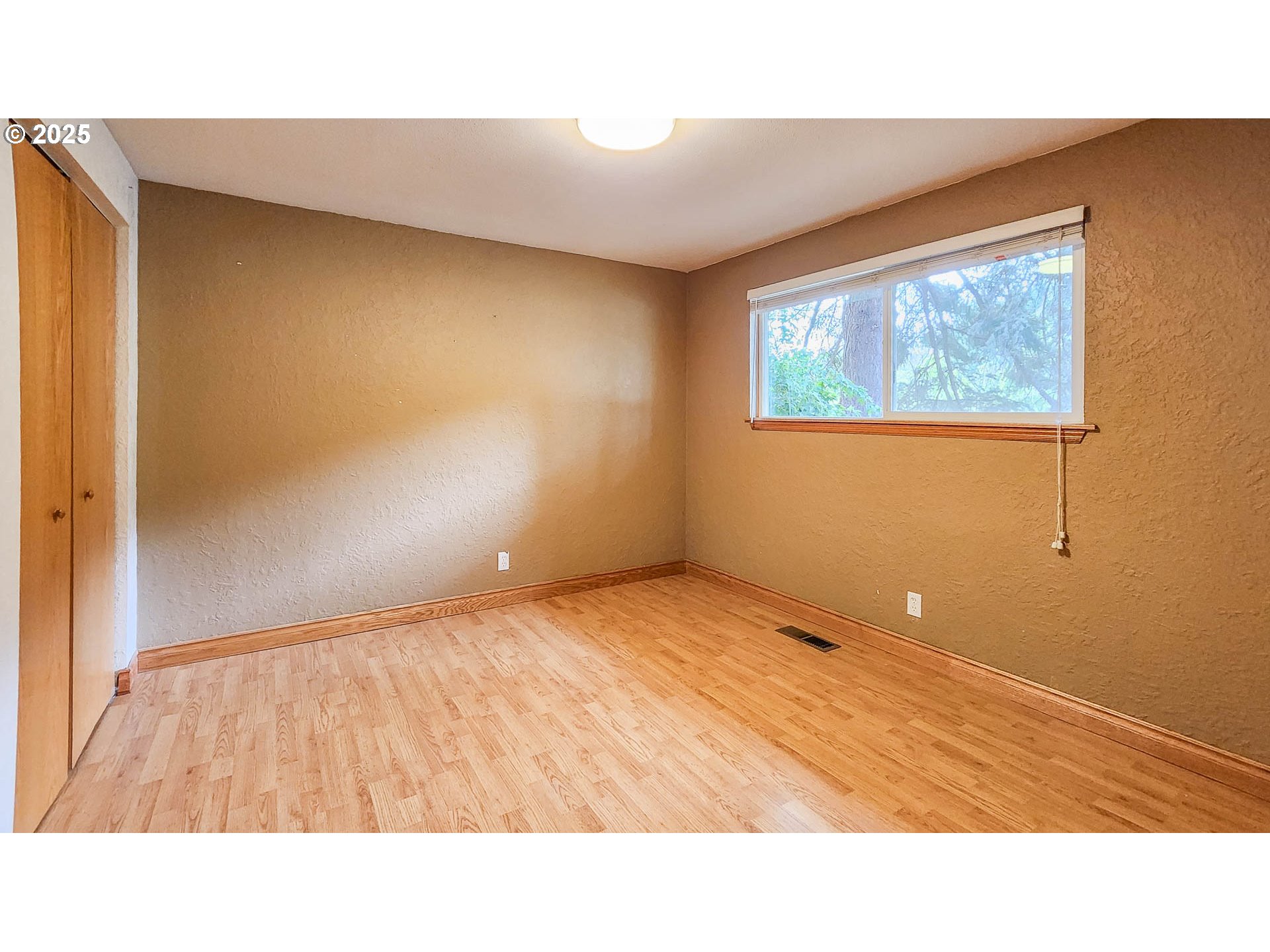 6649 Garden Valley Road Roseburg, OR 97471 - Photo 34 of 44 a room with a bed and wall painting