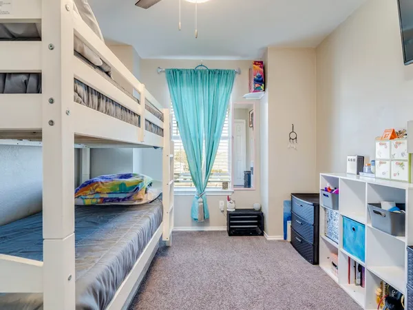 a view of livingroom with furniture and toys