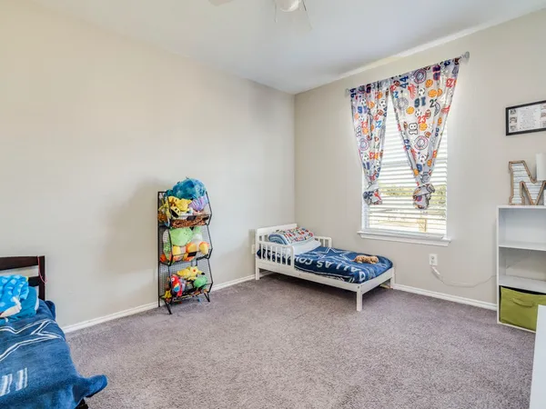 a children room with toys and a couch