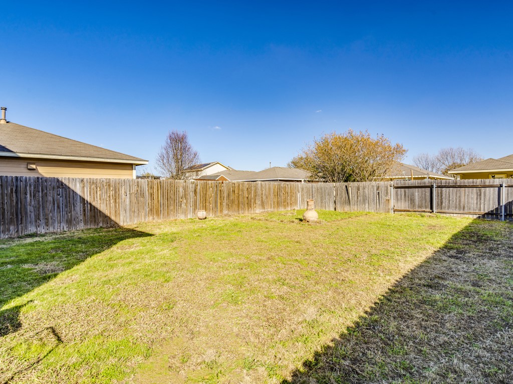 13021 Maidenhair Trail Elgin, TX 78621 - Photo 5 of 25 a view of swimming pool with a backyard