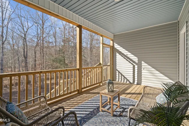 a view of balcony with two trees
