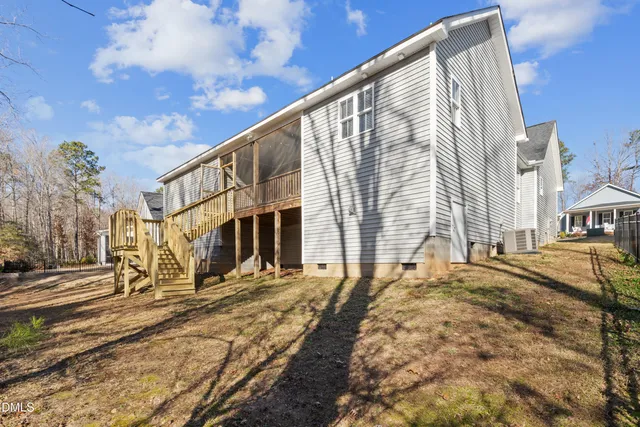 a backyard of a house with lots of green space