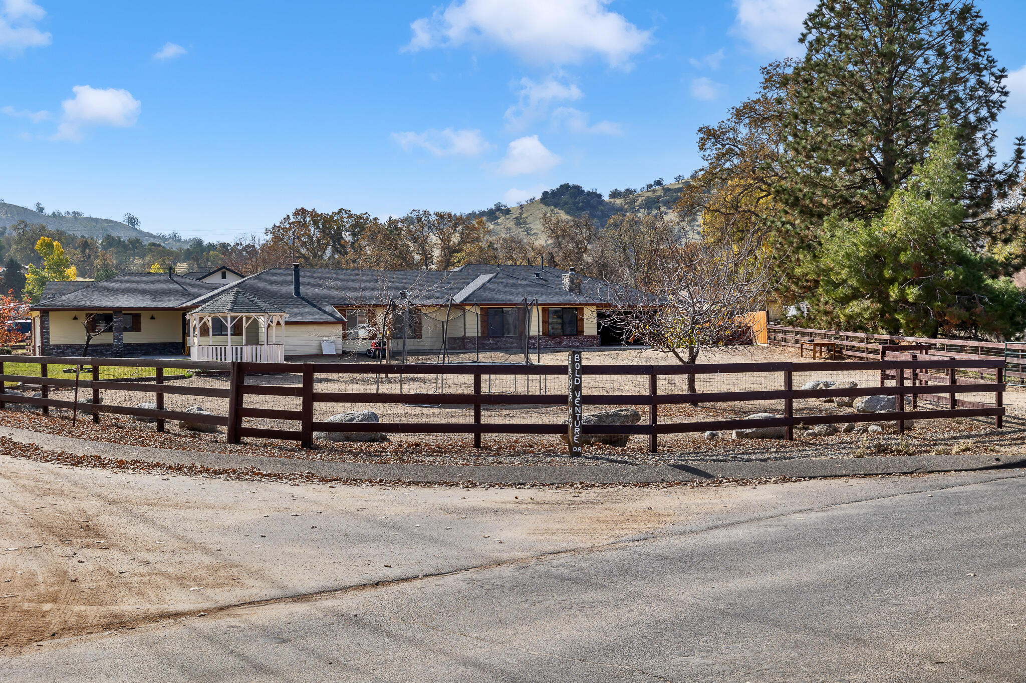a view of a house with a street