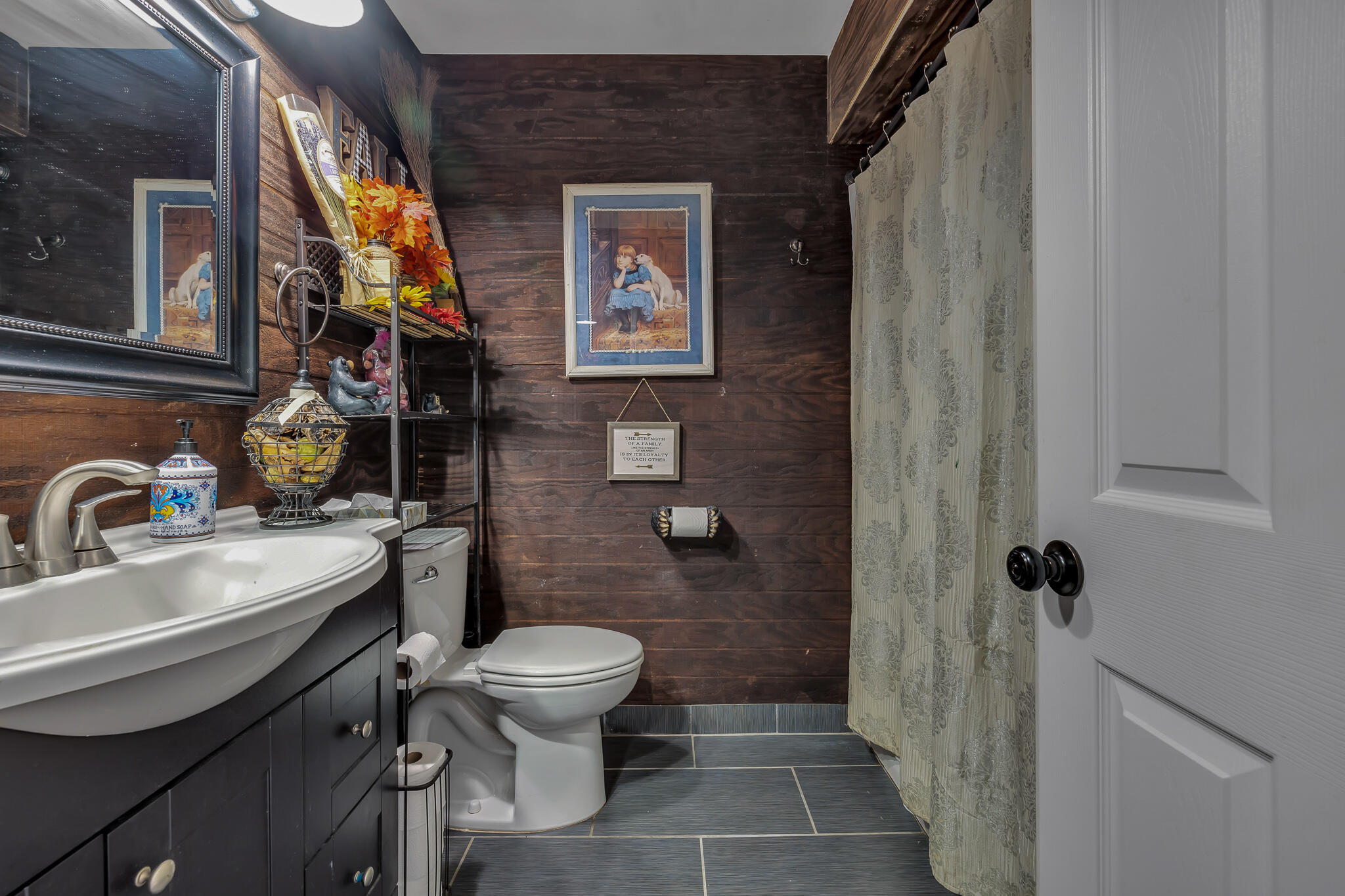 17681 Busher Way Tehachapi, CA 93561 - Photo 15 of 54 a bathroom with a sink toilet and shower